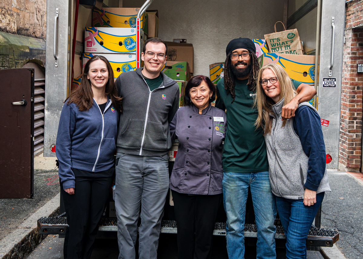 From left: Erin Ash, Ryan Darcey, Inna Khitrik, Steven Lomax, and Ashley Stanley mark Spoonfuls' milestone of 50 million pounds of food recovered at Women's Lunch Place.