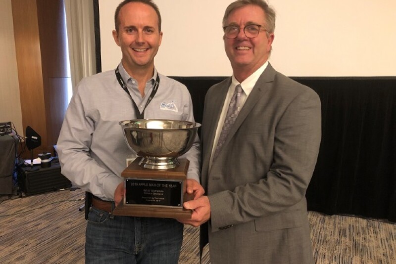 West Mathison, (left) president and CEO of Stemilt Growers, was awarded The Packer's Apple Man of the Year award by Tom Karst, editor of The Packer, on Aug. 22.