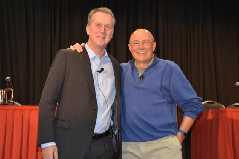 Adrian Percy, left, and Robb Fraley discuss the Bayer/Monsanto merger.