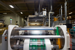Machine printing roll stock for lettuce packaging