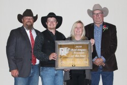 (L to R) Bob, son, Tom, and Julie Morton of Green Mountain Red Angus, presented by Chuck Feddes.