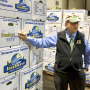 New Jersey secretary of agriculture Douglas Fisher points out the traceability label on FreshWave boxes of produce. The label is yet another example of efforts to increase food safety and traceability.