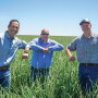 Joe Ange (from left), director of business development for Eagle Eye Produce; Jason Pearson, director of onion sales; and Dan Corn, an Eagle Eye onion grower, share a socially distanced greeting.