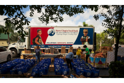 Volunteers at the Harry Chapin Food Bank of Southwest Florida prepare food packages with donated produce for distribution through Brighter Bites program in March. The company is seeking more donations in an effort meet