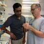 From left, Ram Raghavan, spatial epidemiologist at Kansas State University, and Steve Barker, a leading expert on Australian ticks at the University of Queensland, examine field-collected long-horned ticks in Queensland, Australia.