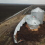 Busted grain bins still sit outside of White Cloud, Kansas. The rotting grain is a reminder of how devastating the flood of 2019 still is for farmers, landowners and residents. 