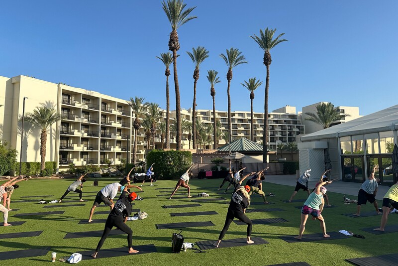 West Coast Produce Expo kicked off with yoga under the palm trees