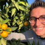 Fruit World founder and CEO Bianca Kaprielian checks out mandarins.