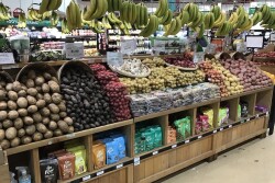 potato display supermarket hanging bananas