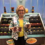 Janice Honigberg, president of Sun Belle,   Schiller Park, Ill. displays cranberries and pomegranate arils at the Produce Marketing Association's Fresh Summit expo.