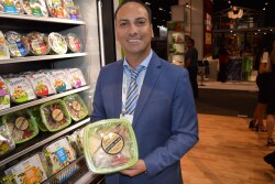 Tal Shoshan, the chief executive officer with FiveStar Gourmet Foods Inc., Ontario, Calif., displays one of the firms new premium salads.