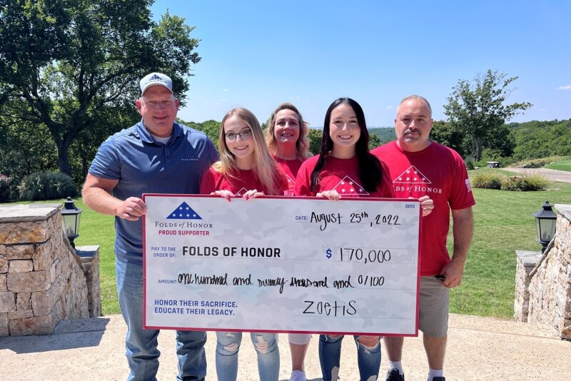 Pictured in the check presentation photo: