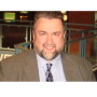 Headshot of man in suit and tie. Photo courtesy of Produce Business