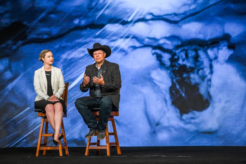 Nicole Erceg, assistant director of communications for CAB, with South Dakota cattlemen Troy Hadrick.
