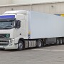 Cooler truck at warehouse loading bay