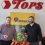 Tops Friendly Markets executives Jeff Cady (from left), director of produce and floral, and Justin Rowe, produce category business manager, market EverCrisp apples, a late-season special variety made from a cross between a Honeycrisp and a fuji.