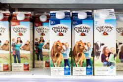 Organic Valley and Maple Hill spearheaded a certification program with a seal appearing on products in grocery stores in 2019 .