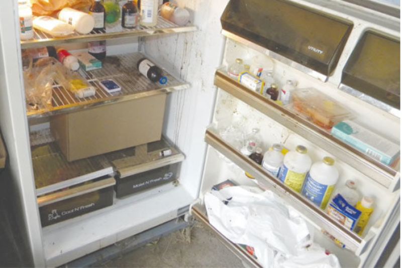 Animal health products stored in a refrigerator.