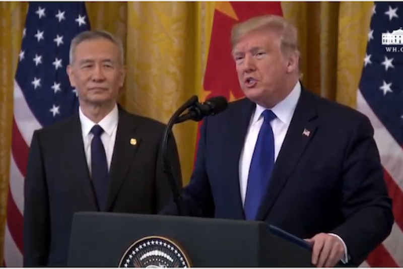 President Donald Trump and Chinese Vice Premier Liu He sign the phase one trade deal.