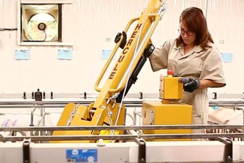 A worker operates the Hercules Arm
