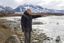 Gutkoski stands next to the Yellowstone River. During the last seven legislative sessions, Gutkoski, 89, has pushed for a change in Montana's water laws that would require minimum instream flows on important fisheries across the state.
