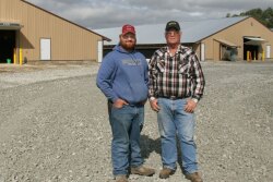 Nebraska farmer Colten Schafersman (left) purchased 100 acres from his grandfather, John Snover, (right) to build two hen houses and one rooster house for pullet production. 