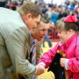 The crowd roared as judges Ryan Sites (left) and Brandon Yantis awarded Samantha Iselt the grand champion barrow overall award at the 2020 San Antonio Stock Show and Rodeo. 