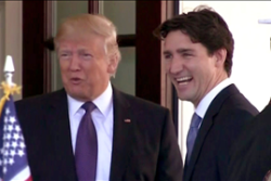 (Undated Photo) Canadian Prime Minister Justin Trudeau and President Donald Trump share a lighter moment during a state visit in March 2018.