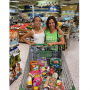mom and daughter shopping cart in grocery store