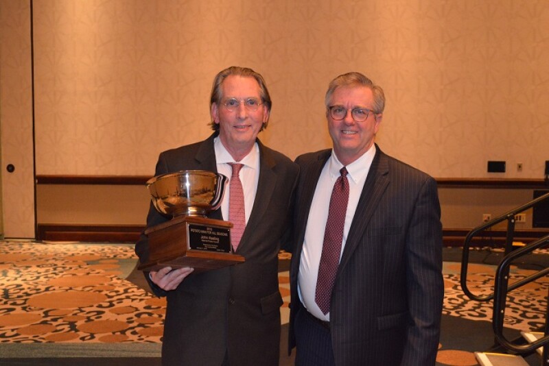 John Keeling (left), is the 2018 Potato Man for All Seasons, presented Jan. 11 by The Packer's editor Tom Karst. 