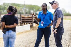 UNL professor Galen Erickson talks to attendee Raissa Urujeni.