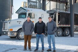 From left, brothers Andrew and Philip Hanna are combining their individual Iowa farm operations with their father, Mark. 