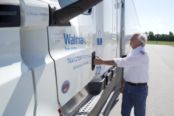 guy getting into a semi truck