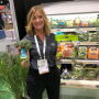  Jennifer Rigdon, business development manager for Southern Specialties, Pompano Beach, Fla., displays new product offerings at Produce Marketing Association's Fresh Summit expo.