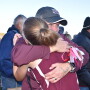 Olivia Shike and Coach Kara Leaman after State Cross Country Meet