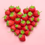 Strawberries arranged in shape of heart