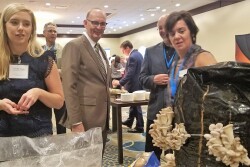 USDA Under Secretary for Marketing and Regulatory Programs Greg Ibach (center) and Caroline Young (left), with the National Peanut Board, get the facts about mushrooms from Mushroom Council Chairperson Gale Ferranto and Mushroom Council Foodservice Director Steve Solomon (2nd from right). 