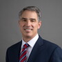 Scott Wine is the Chief Executive Officer of CNH Industrial N.V. and an executive director on the Company’s Board of Directors. 