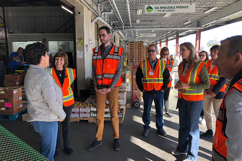 California Department of Food and Agriculture Secretary Karen Ross (left), toured the San Francisco Market. Attendees engaged with several merchant businesses, some of which have been family-run for more than three generations. 