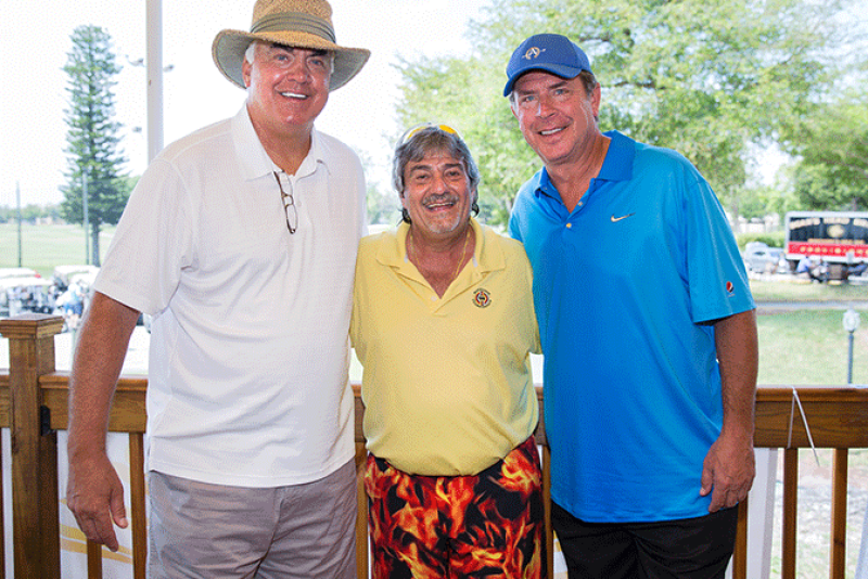 Don Strock, former Miami Dolphins player; Bruce Fishbein, president of The Produce Connection; and Dan Marino, also a former Dolphins player, share a moment at last year's Don Strock Diabetes Golf Classic.