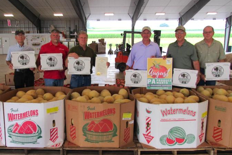 The governor's PA Produce Month proclamation was presented at Buffalo Valley Produce Auction in Mifflinburg, Pa., including (left to right) William Pyle, auction board president; Scott Hoffman, Vegetable Marketing and Research Program vice chairman; Neil Courtney, auction manager; Russell Redding, Pennsylvania secretary of Agriculture; William Troxell, Vegetable Program exec. secretary; and John Esslinger of Penn State Extension.