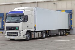 Cooler truck at warehouse loading bay