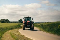Tractor on Road by Canva.com