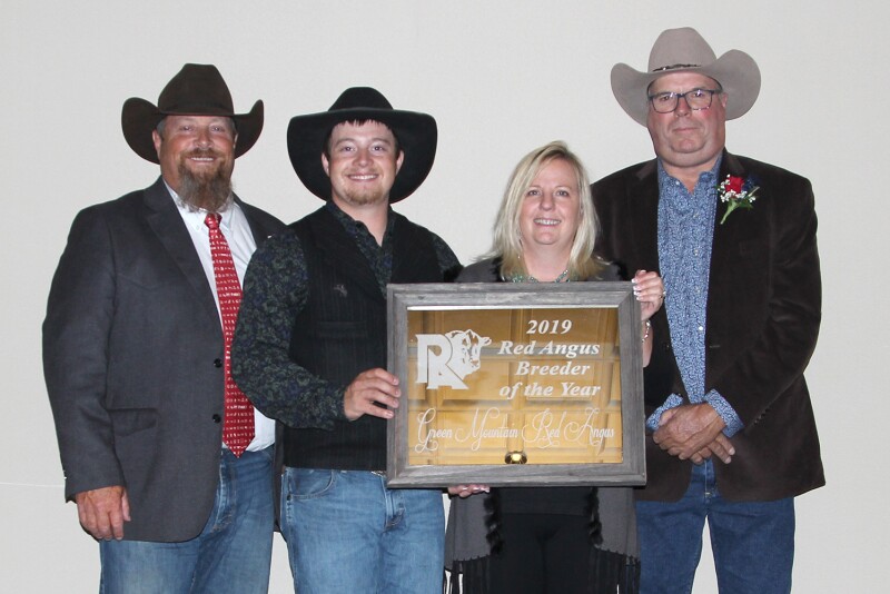 (L to R) Bob, son, Tom, and Julie Morton of Green Mountain Red Angus, presented by Chuck Feddes.
