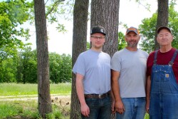 Three generations of Pembertons, including Brian, father Richard and son Cade, run the grassland farm in the northwest corner of Monroe County. 