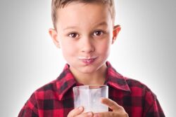 Kid Drinking Milk_Canva