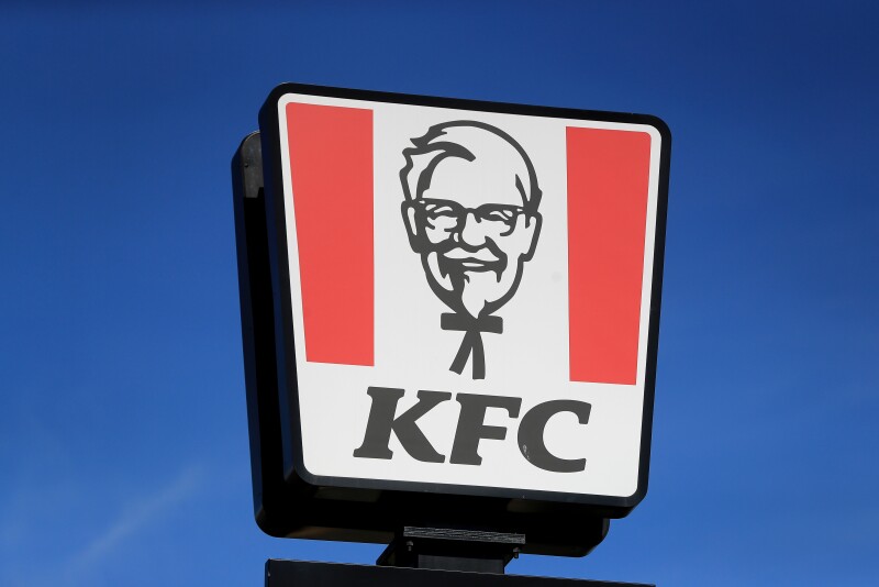 PA via Reuters A view of the sign at a KFC restaurant and drive-thru
