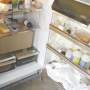 Animal health products stored in a refrigerator.