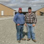 Nebraska farmer Colten Schafersman (left) purchased 100 acres from his grandfather, John Snover, (right) to build two hen houses and one rooster house for pullet production. 