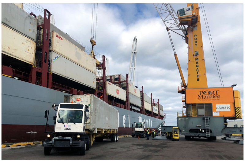 Containers are offloaded from Fresh Del Monte Produce Inc.’s Del Monte Spirit as the energy-efficient vessel makes its Jan. 9 inaugural call at Port Manatee.